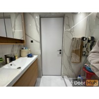White HPL Interior Door with Timeless Gold Anodized Profile – Developer-Grade Supply UAE